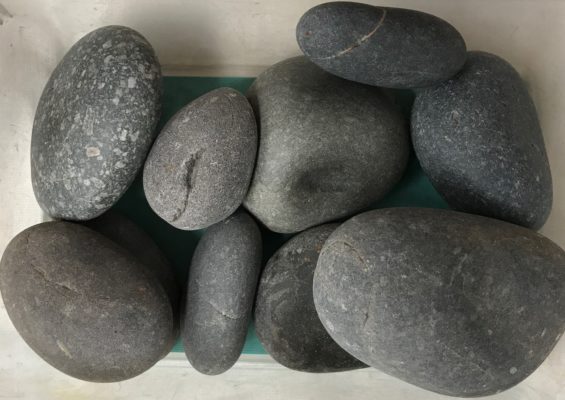 close-up of black mexican beach pebbles at stone garden