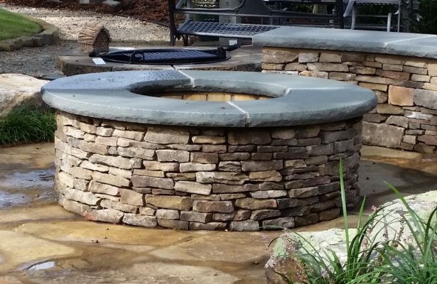 round stone fire-pit in the inspiration garden