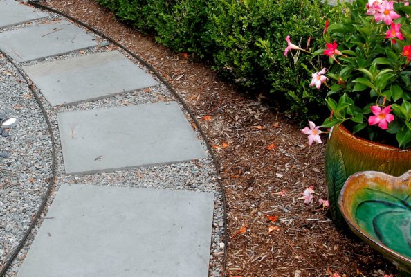 edging on a stepping stone path at stone garden landscape supply