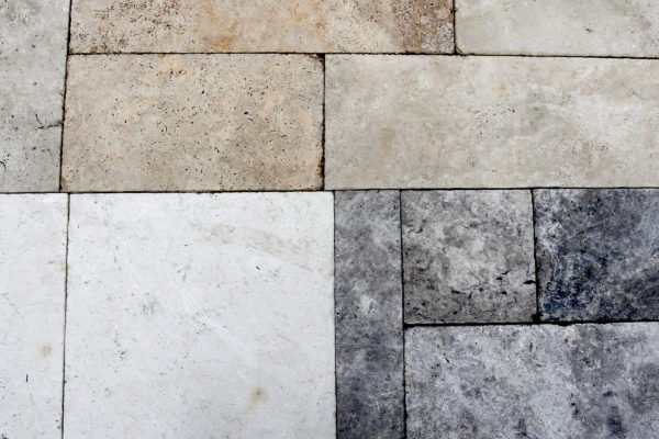 travertine stone tiles in three different colors