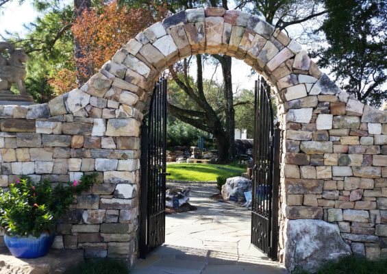 inspiration garden stone arch entrance with iron gate