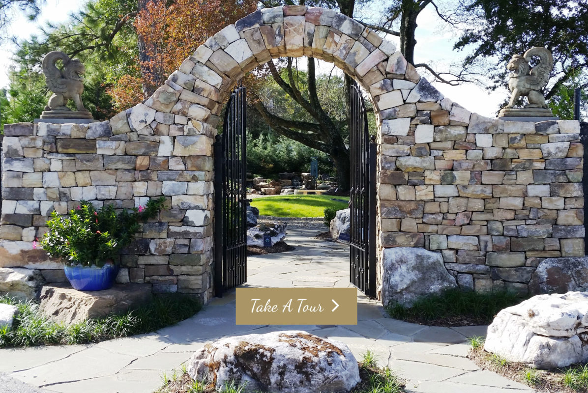 inspiration garden stone arch entrance with iron gate